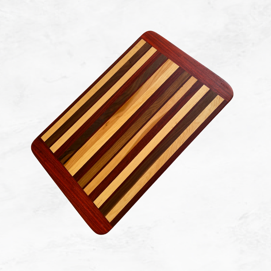 Striped hardwood cutting board – Padauk, Walnut, Cherry & Maple